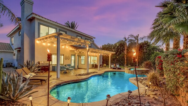 A house with a swimming pool, outdoor seating, and string lights. - Terra Azul: Pool, Spa, Billiard Table, Foosball (Indio)