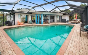 A heated pool - Waterfront 3BR Marco Island home with heated pool, Wi-Fi, and space for 8. (Marco Island)