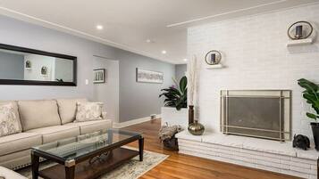 TV, fireplace, books, offices