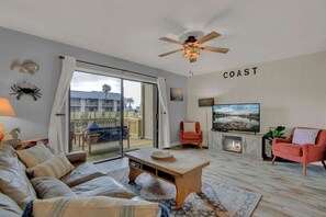 Smart TV, fireplace, books, offices