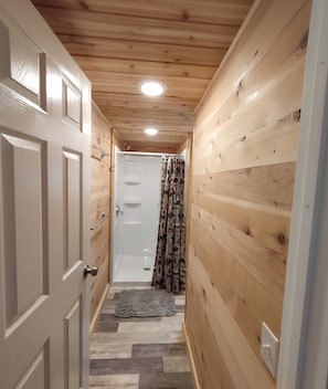 Combined shower/tub, toilet paper