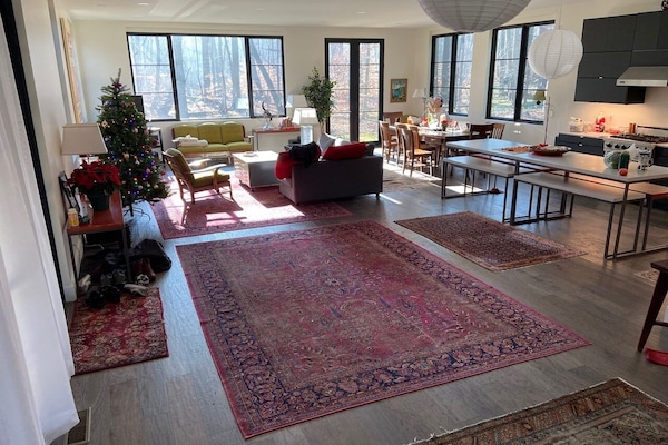 Open concept living/dining/kitchen for the family to gather.
