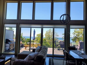 Smart TV, fireplace, books, computer monitors