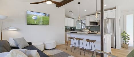 Smart TV, fireplace, books