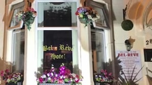 The exterior of the Bel-Reve Hotel with its name displayed above the entrance. - Bel Reve Hotel (Blackpool)