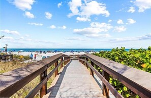 On the beach, sun-loungers, beach towels