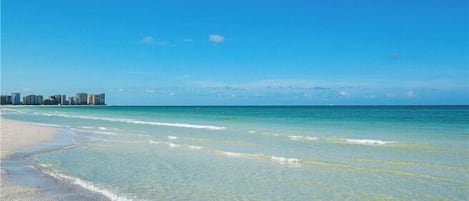 On the beach, sun-loungers, beach towels