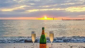 On the beach, sun loungers, beach towels