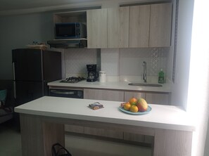 Fridge, microwave, coffee/tea maker, electric kettle