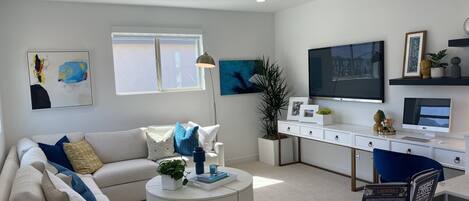 Télévision, cheminée, table de tennis de table