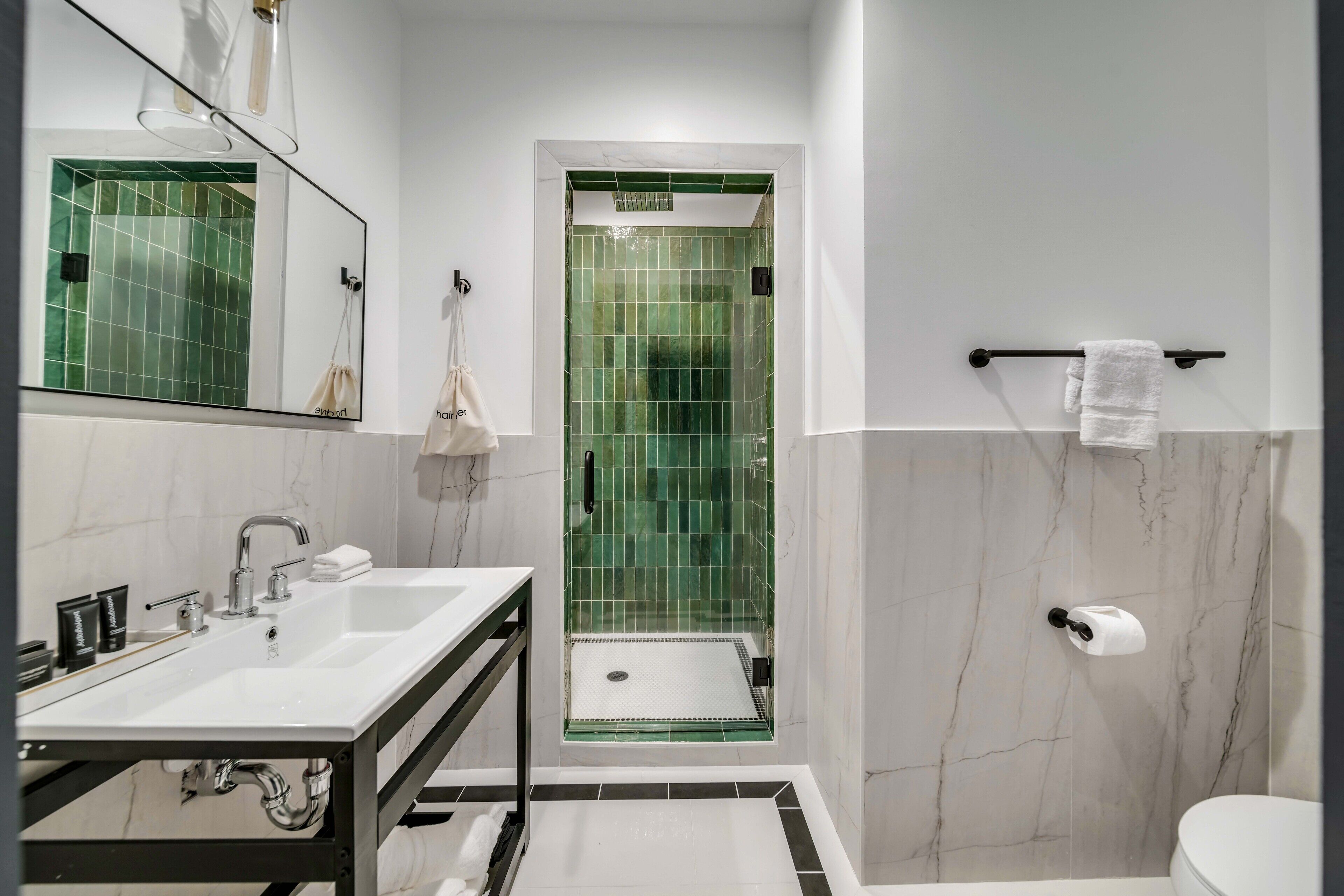 premium room, 1 queen bed | bathroom | shower, rainfall showerhead, free toiletries, hair dryer