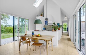 Enjoy cooking in the spacious kitchen with a large island, sink, and ample counter space.