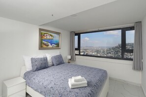 Premium bedding, in-room safe, desk, cots/infant beds