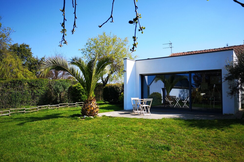 Bright house between port and beach