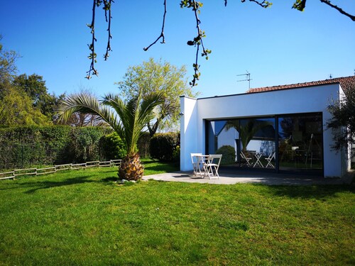 Bright house between port and beach