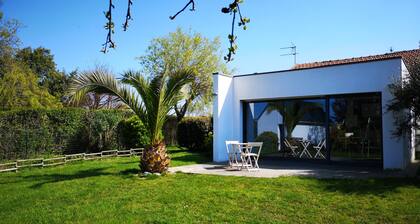 Bright house between port and beach