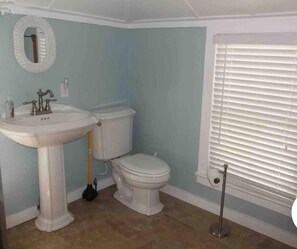Bathtub, hair dryer, towels, soap