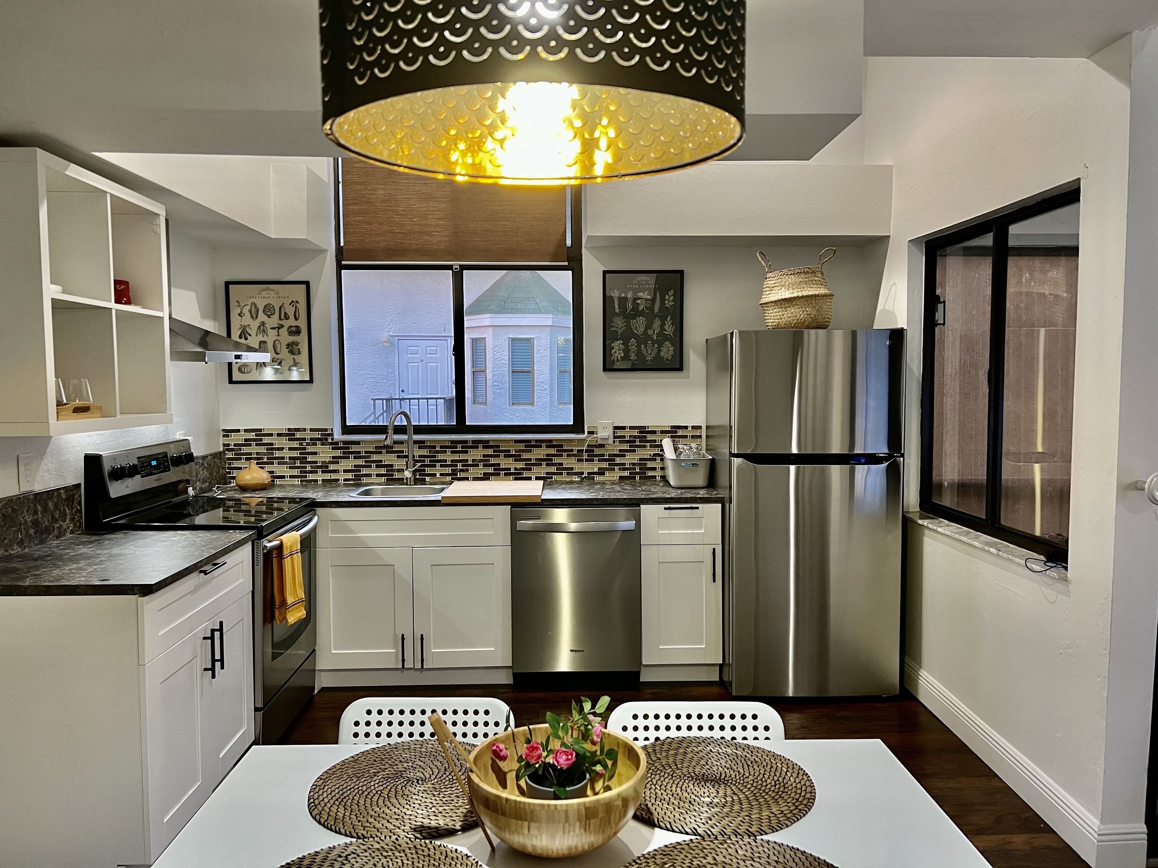 Microwave, dishwasher, coffee/tea maker, cookware/dishes/utensils