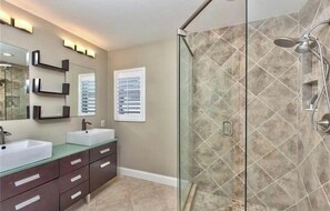 Combined shower/tub, hair dryer, towels, soap