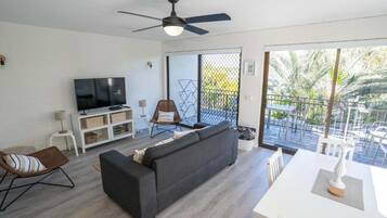 Two Bedroom Apartment with Balcony | Living room | Flat-screen TV, DVD player