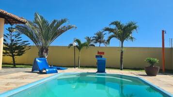 Outdoor pool, open 6:00 AM to 10:00 PM, sun loungers