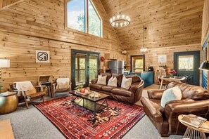 Smart TV, fireplace, table football, books