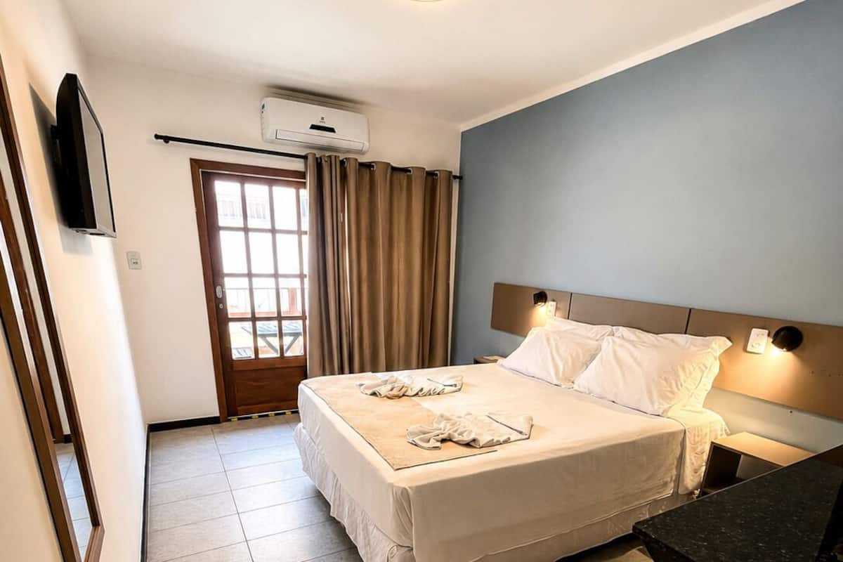 Superior Double Room, Patio | Desk, laptop workspace, blackout drapes, iron/ironing board (on request)
