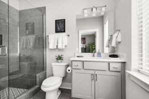 Combined shower/bathtub, hair dryer, towels, soap
