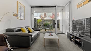 Apartment | Living area | 42-inch TV with digital channels