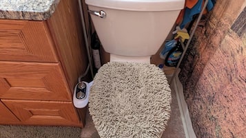 Bathtub, bidet, towels, soap