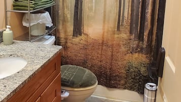 Bathtub, bidet, towels, soap