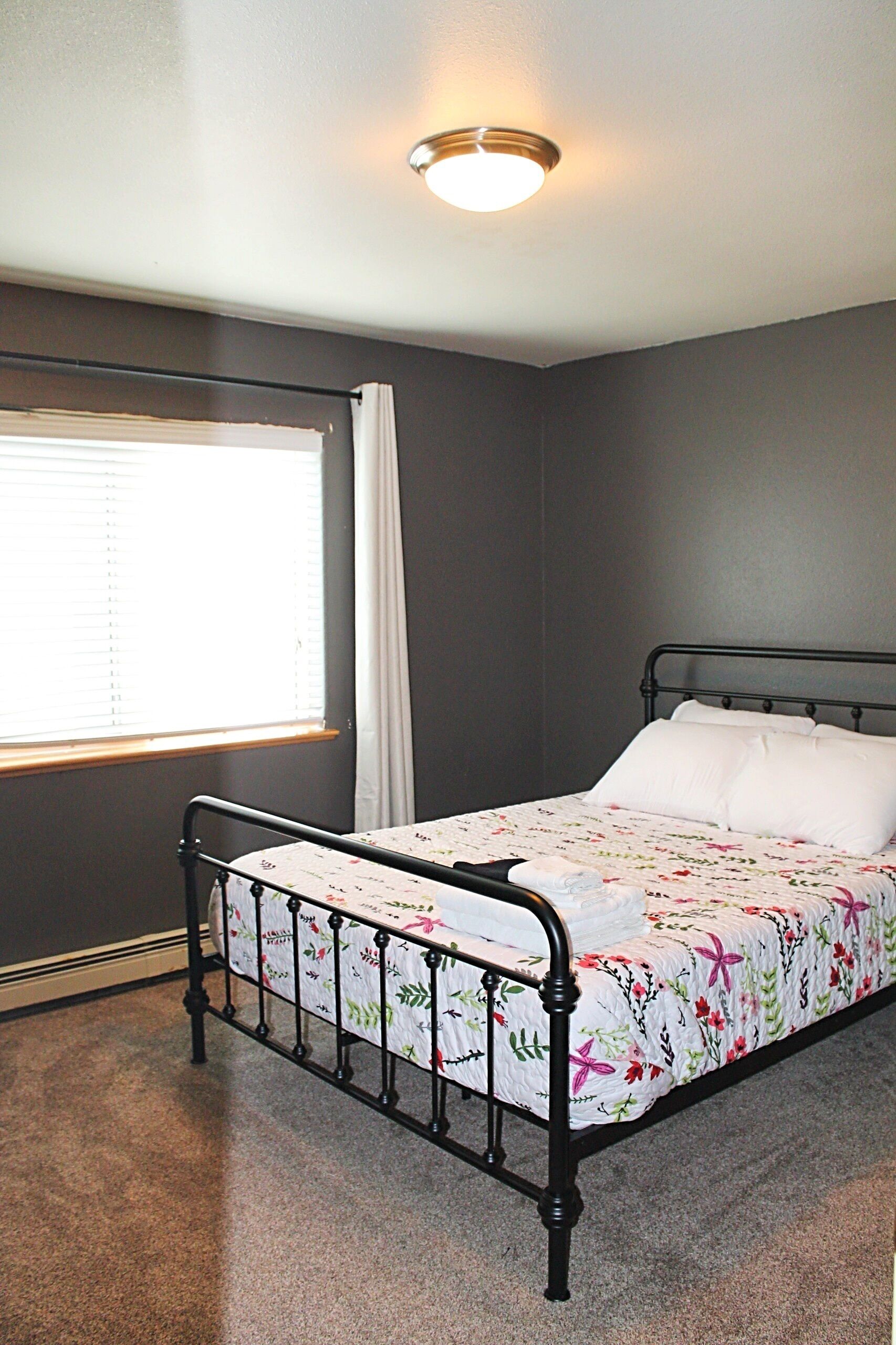 Centrally located cozy 4 bedroom twnhme /with 2 car garage and fenced backyard .