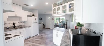 Bright Waterfront Home with Pool. Short drive to Beach. Beautiful Sunsets.