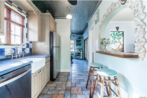 Fridge, microwave, oven, stovetop - "Once Upon a Tide" eclectic beach house with pizza oven, game room, fireplace (Long Beach)