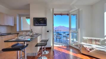 Family Apartment, Multiple Bedrooms, 2 Bathrooms, Mountainside (Penthouse The Magnifique View) | Living area | 21-inch flat-screen TV with digital channels, TV