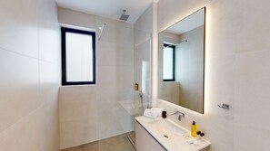 Shower, towels, soap, shampoo