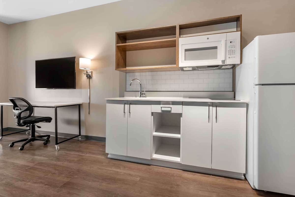 standard studio, 1 king bed, non smoking, refrigerator & microwave | laptop workspace, iron/ironing board, bed sheets