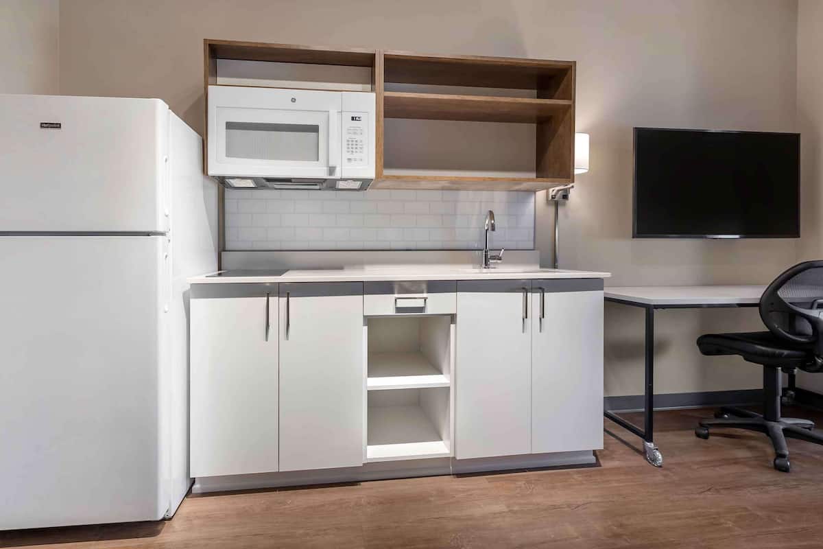 standard studio, 1 queen bed, non smoking, refrigerator & microwave | laptop workspace, iron/ironing board, bed sheets