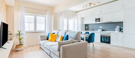 Apartment, 3 Bedrooms | Living area | 50-cm flat-screen TV with cable channels, TV