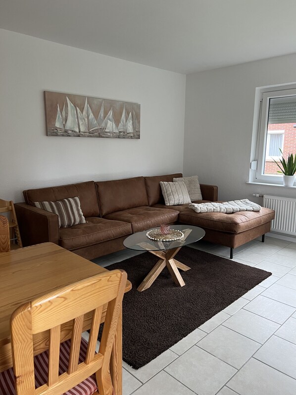 Smart TV, DVD player, foosball, books