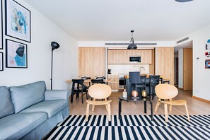Apartment, 2 Bedrooms, Terrace | Living area | 50-cm flat-screen TV with cable channels, TV
