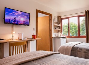 Desk, blackout drapes, iron/ironing board, free WiFi