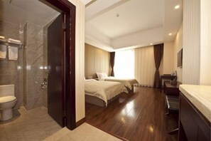 A hotel room with a shower, two beds, a desk, and a TV. - Vienna Classic Hotel (Fuzhou Changle Langqiao Hotel) (Fuzhou)