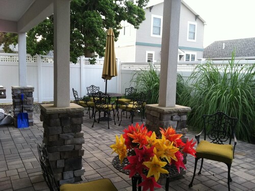 Large custom Home with ocean view, roof top deck, off street parking.