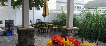 Large custom Home with ocean view, roof top deck, off street parking.