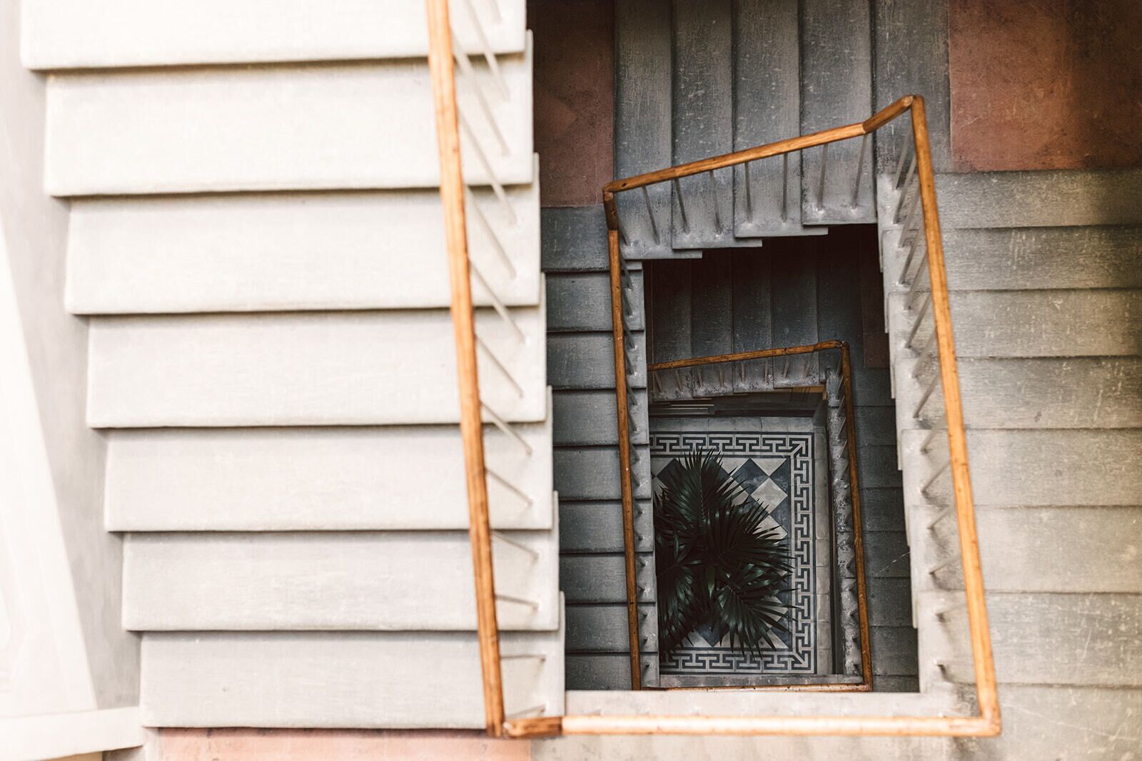 A window with a decorative frame and a geometric pattern.