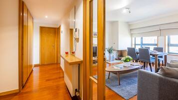 Apartment, 1 Bedroom | Living area | 50-cm flat-screen TV with cable channels, TV