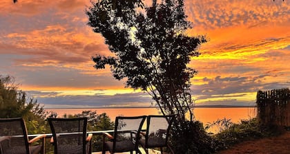 Vintage Waterfront Cottage with Stunning Sunsets