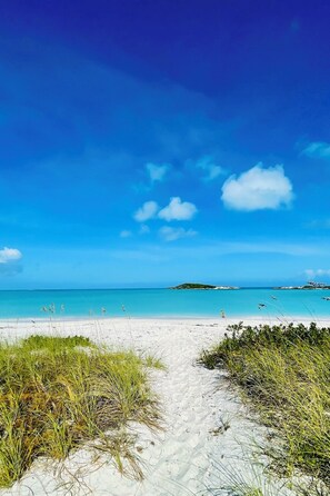 On the beach, sun-loungers, beach towels