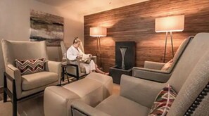 Relax in style with plush seating and adjustable lighting.